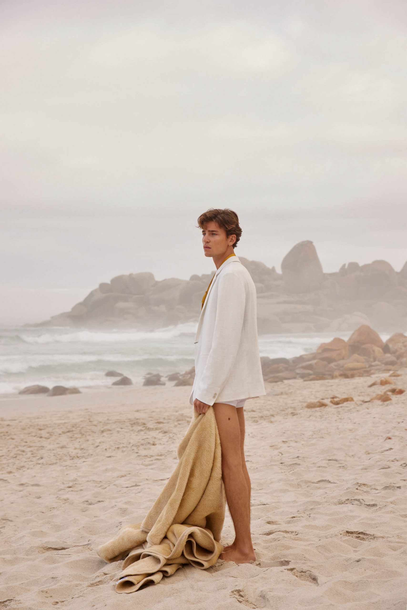 Male model shooting beach